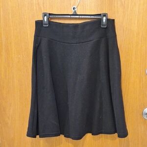 Black flared skirt with pockets